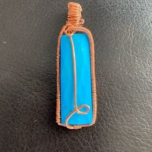 Wire turquoise wrapped pendant 17.5 carats
